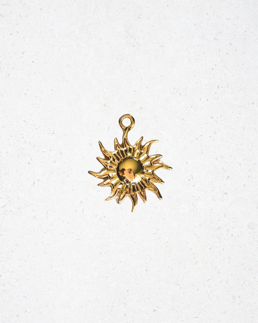 Gold Sunburst Charm