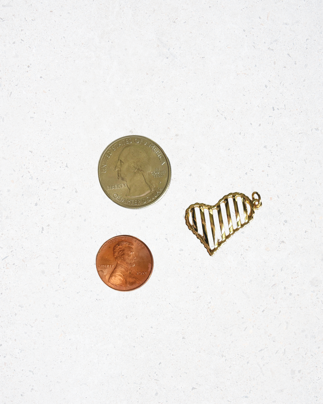 Gold Grate Heart Charm